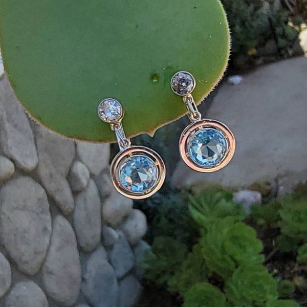 Gold and aquamarine earrings and a rock crystal pendant💦both sitting in  the rain and wishing the sun would shine😖 I think my toes are… | Instagram